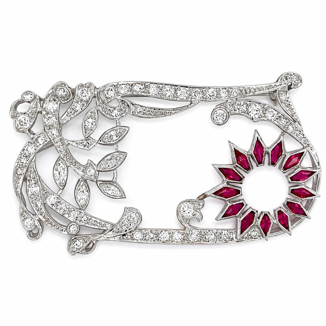 Platinum Art Deco Brooch with Diamonds and Rubies 2.25 x 1.25 Inches: Platinum Art Deco Brooch with Diamonds and Rubies 2.25 x 1.25 Inches This Art Deco brooch is crafted in platinum and set with approximately 2.50 carats of diamonds featuring G-I color and VVS-VS clari