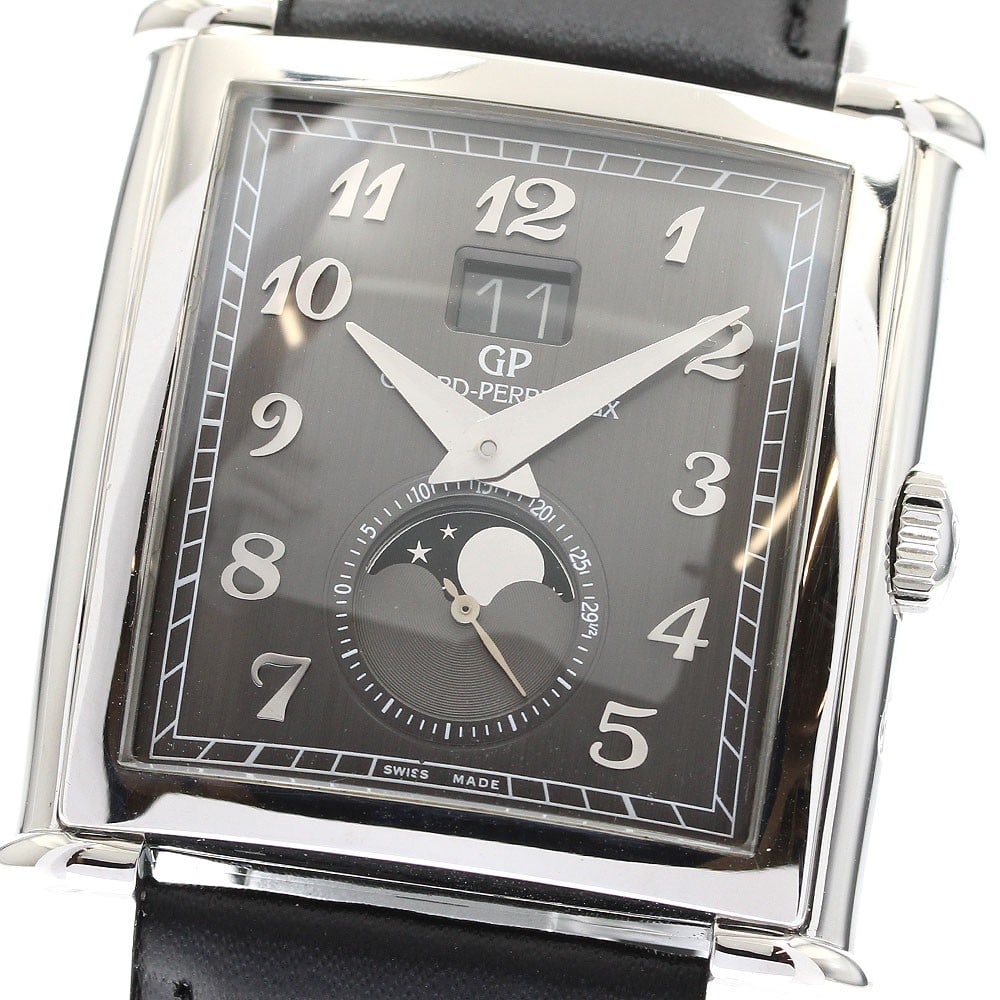 Girard Perregaux Vintage 1945 XXL automatic moon phase watch: Girard Perregaux Vintage 1945 XXL automatic moon phase watch This Girard Perregaux Vintage 1945 XXL Large men's wristwatch features a stainless steel case and a gray dial, complemented by an un-used a