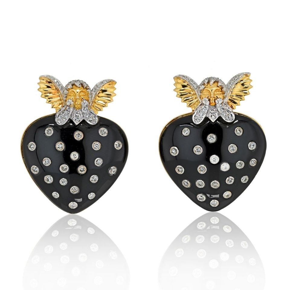David Webb 18K Gold Cupid Black Enamel Diamond Heart Clip Earrings: David Webb 18K Gold Cupid Black Enamel Diamond Heart Clip Earrings Elevate your jewelry collection with these exquisite David Webb earrings, featuring a whimsical heart design crafted from striking bl
