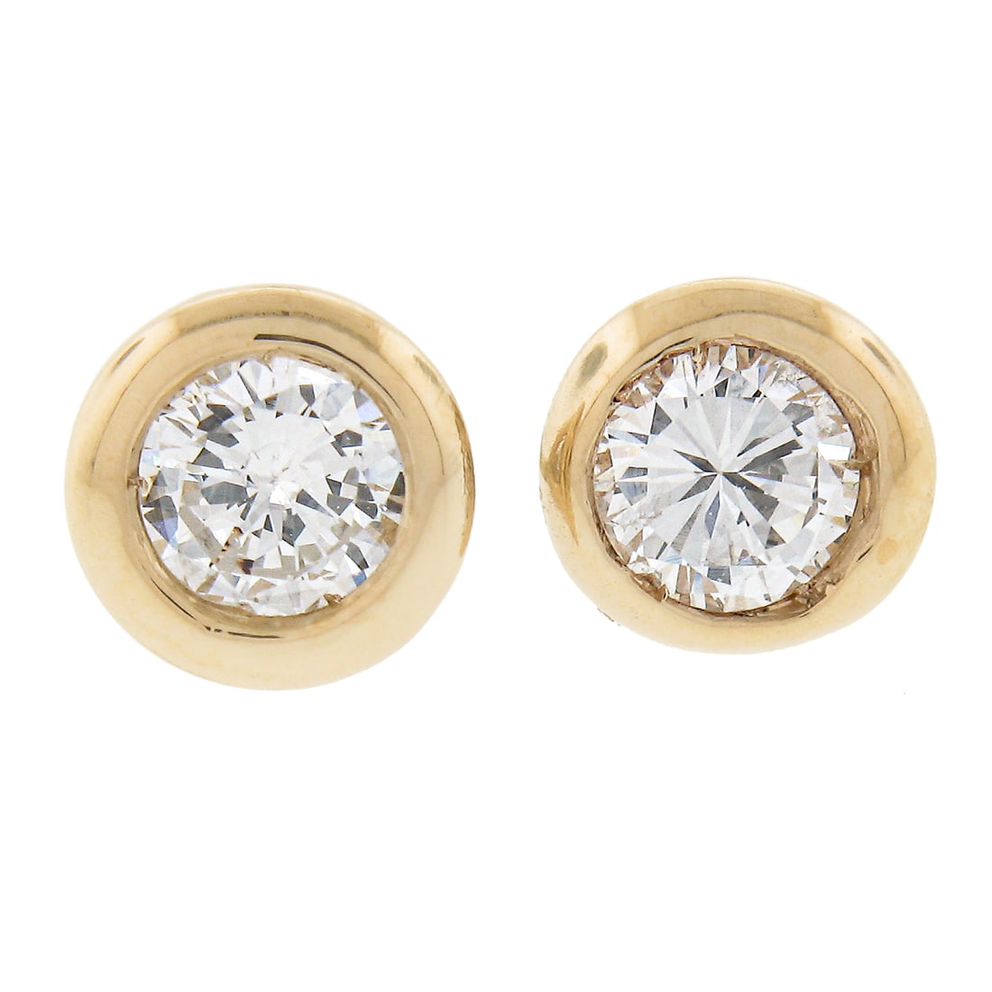 14k Yellow Gold 0.27ctw Martini Bezel Diamond Stud Earrings: 14k Yellow Gold 0.27ctw Martini Bezel Diamond Stud Earrings Elevate your elegance with these stunning 14k Yellow Gold Martini Bezel Round Brilliant Diamond Stud Earrings. Designed for pierced ears, th