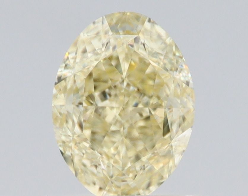 Loose Diamond - OVAL 1.01ct Fancy Light Yellow VS1: Loose Diamond - OVAL 1.01ct Fancy Light Yellow VS1 Source: Natural Shape: OVAL Carats: 1.01 Color: Fancy Light Yellow Certification: GIA Video: