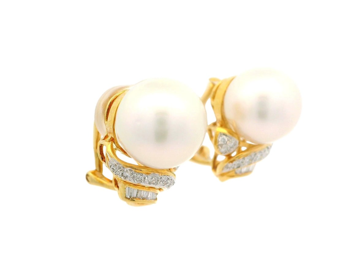 Pair of 18k Yellow Gold Earrings with 11.2mm Pearl and Diamond Accents: Pair of 18k Yellow Gold Earrings with 11.2mm Pearl and Diamond Accents These elegant earrings feature two genuine cultured pearls, each measuring approximately 11.2mm in diameter with a white color an