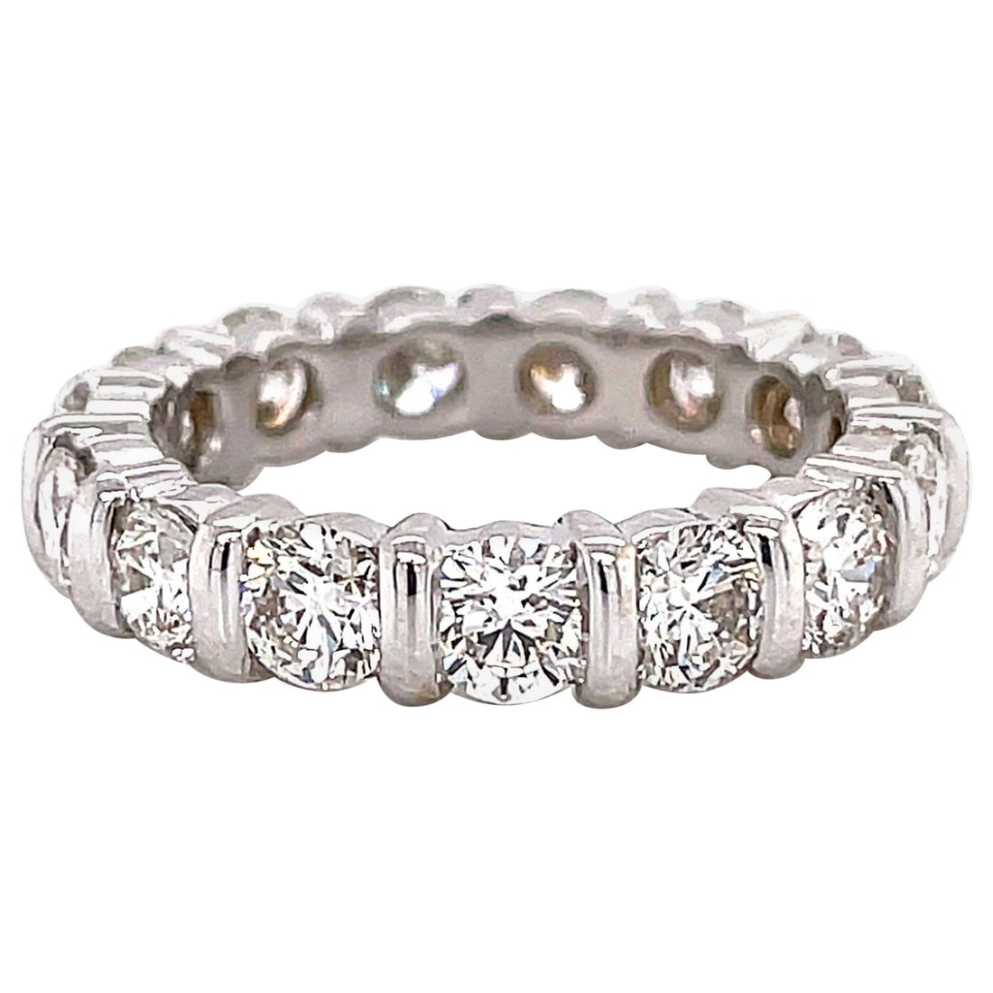 3.42ct Diamond Eternity Band in 18k White Gold Size 6.5: 3.42ct Diamond Eternity Band in 18k White Gold Size 6.5 This stunning 3.42ct Channel Set Round Diamond Eternity Band is a perfect blend of elegance and contemporary design. Crafted from luxurious 18k 