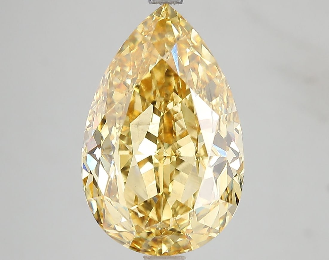 Loose Diamond - PEAR 7.58ct Fancy Vivid Yellow VS2: Loose Diamond - PEAR 7.58ct Fancy Vivid Yellow VS2 Source: This is a real non-mined Diamond that has been grown in a lab Shape: PEAR Carats: 7.58 Color: Fancy Vivid Yellow Certification: IGI Video: