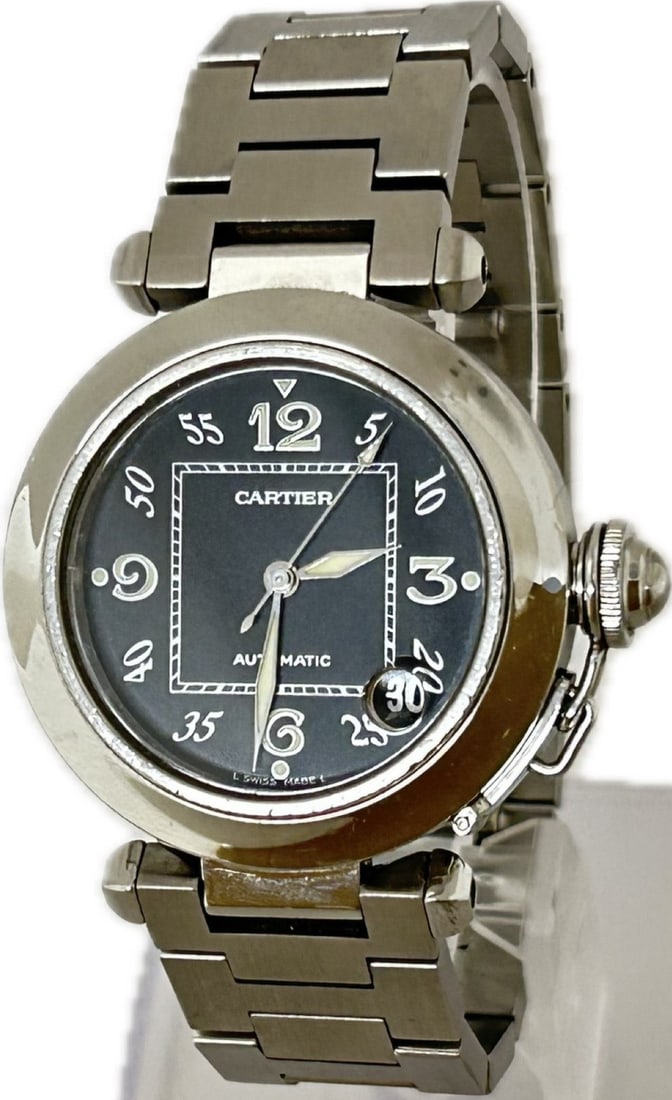 Cartier Pasha C Automatic Stainless Steel Black Dial Unisex Watch: Cartier Pasha C Automatic Stainless Steel Black Dial Unisex Watch This Cartier Pasha C W31043M7 is a unisex automatic wristwatch featuring a black dial and a stainless steel case and bracelet. Manufac
