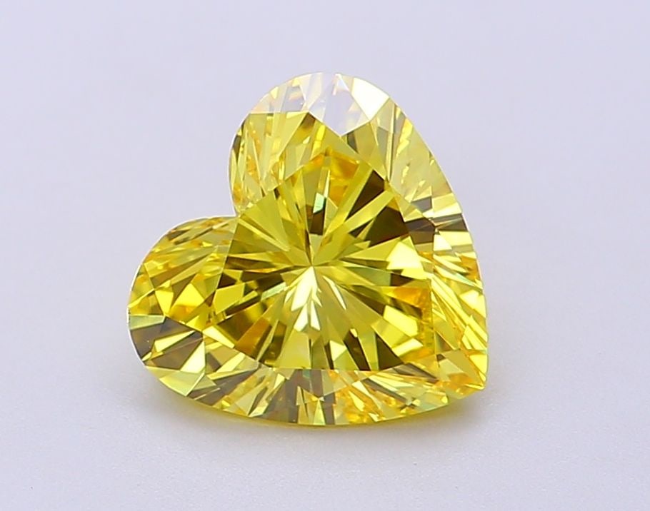 Loose Diamond - HEART 2.03ct Fancy Vivid Yellow VS1: Loose Diamond - HEART 2.03ct Fancy Vivid Yellow VS1 Source: This is a real non-mined Diamond that has been grown in a lab Shape: HEART Carats: 2.03 Color: Fancy Vivid Yellow Certification: IGI Video: