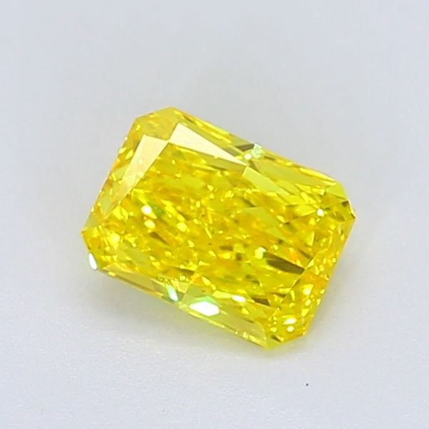 Loose Diamond - RADIANT 0.91ct Fancy Vivid Yellow VS1: Loose Diamond - RADIANT 0.91ct Fancy Vivid Yellow VS1 Source: This is a real non-mined Diamond that has been grown in a lab Shape: RADIANT Carats: 0.91 Color: Fancy Vivid Yellow Certification: IGI Vid