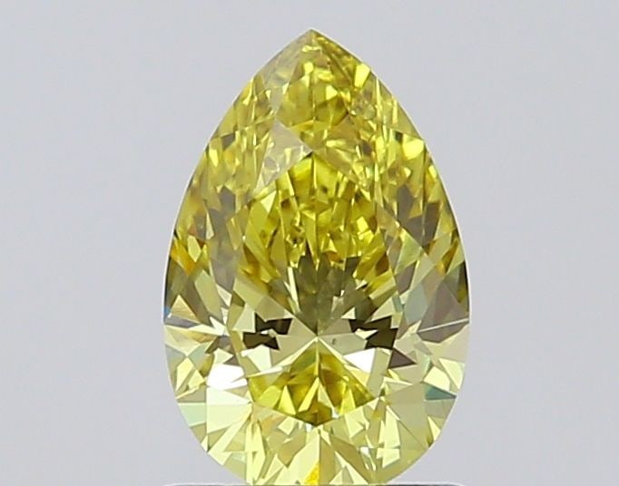 Loose Diamond - PEAR 1.02ct Fancy Vivid Yellow VS1: Loose Diamond - PEAR 1.02ct Fancy Vivid Yellow VS1 Source: This is a real non-mined Diamond that has been grown in a lab Shape: PEAR Carats: 1.02 Color: Fancy Vivid Yellow Certification: IGI Video: