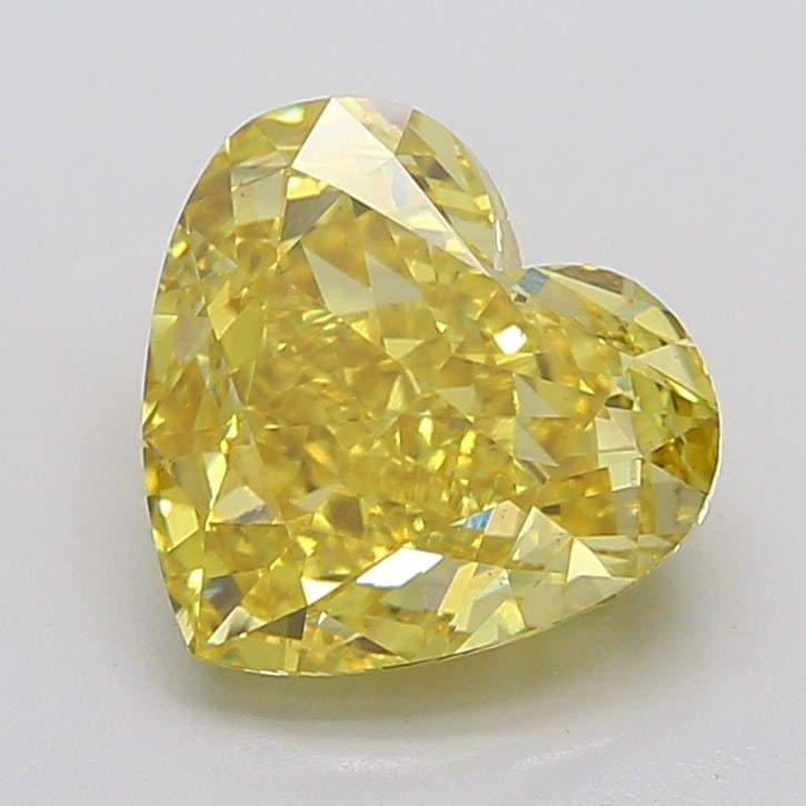 Loose Diamond - HEART 6.96ct Fancy Vivid Yellow VS1: Loose Diamond - HEART 6.96ct Fancy Vivid Yellow VS1 Source: This is a real non-mined Diamond that has been grown in a lab Shape: HEART Carats: 6.96 Color: Fancy Vivid Yellow Certification: IGI Video: