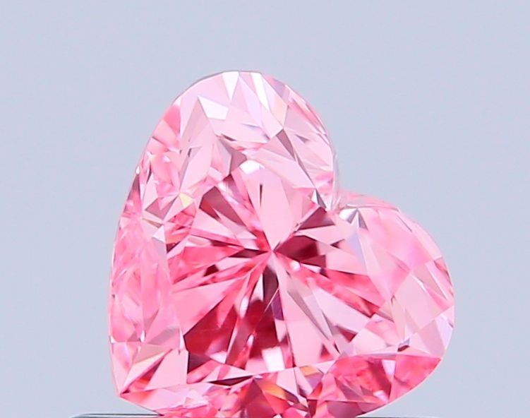 Loose Diamond - HEART 0.83ct Fancy Vivid Pink VVS2: Loose Diamond - HEART 0.83ct Fancy Vivid Pink VVS2 Source: This is a real non-mined Diamond that has been grown in a lab Shape: HEART Carats: 0.83 Color: Fancy Vivid Pink Certification: IGI Video: