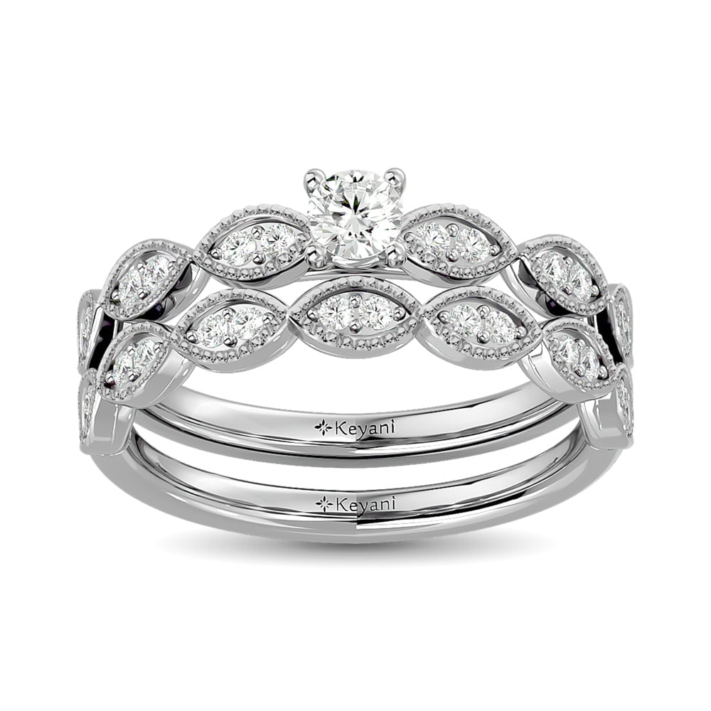 Diamond 3/4 Ct.Tw. Bridal Ring in 14K White Gold: Diamond 3/4 Ct.Tw. Bridal Ring in 14K White Gold 14k White Gold Stone Color: G-h Stone Clarity: Si2 Each ring is presented in standard size 6.5. Complimentary resizing is available between sizes 510 (