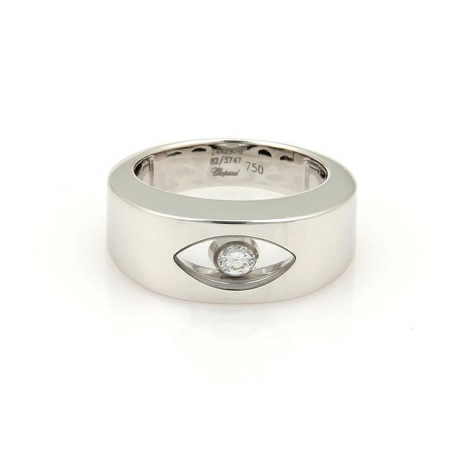 Chopard Happy Diamond Eye Ring 18k White Gold 8mm Band: Chopard Happy Diamond Eye Ring 18k White Gold 8mm Band This exquisite Chopard Eye Ring from the Happy Diamond collection features a stunning design crafted from 18k white gold with a polished finish. 