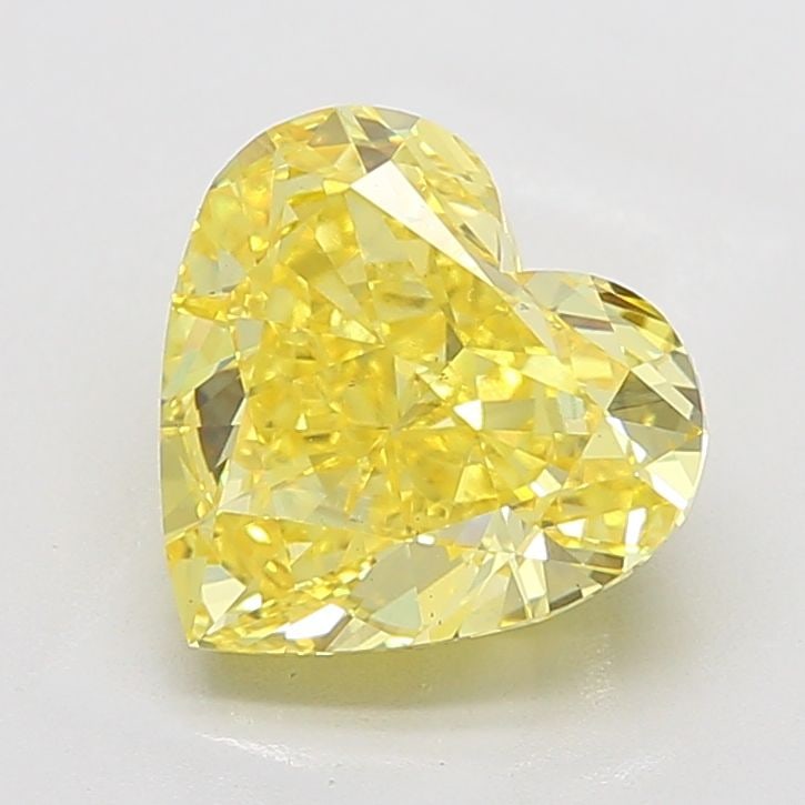 Loose Diamond - HEART 5.47ct Fancy Vivid Yellow VS1: Loose Diamond - HEART 5.47ct Fancy Vivid Yellow VS1 Source: This is a real non-mined Diamond that has been grown in a lab Shape: HEART Carats: 5.47 Color: Fancy Vivid Yellow Certification: IGI Video:
