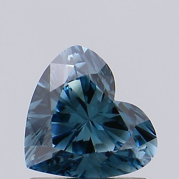 Loose Diamond - HEART 0.9ct Fancy Vivid Green Blue VS1: Loose Diamond - HEART 0.9ct Fancy Vivid Green Blue VS1 Source: This is a real non-mined Diamond that has been grown in a lab Shape: HEART Carats: 0.9 Color: Fancy Vivid Green Blue Certification: IGI V
