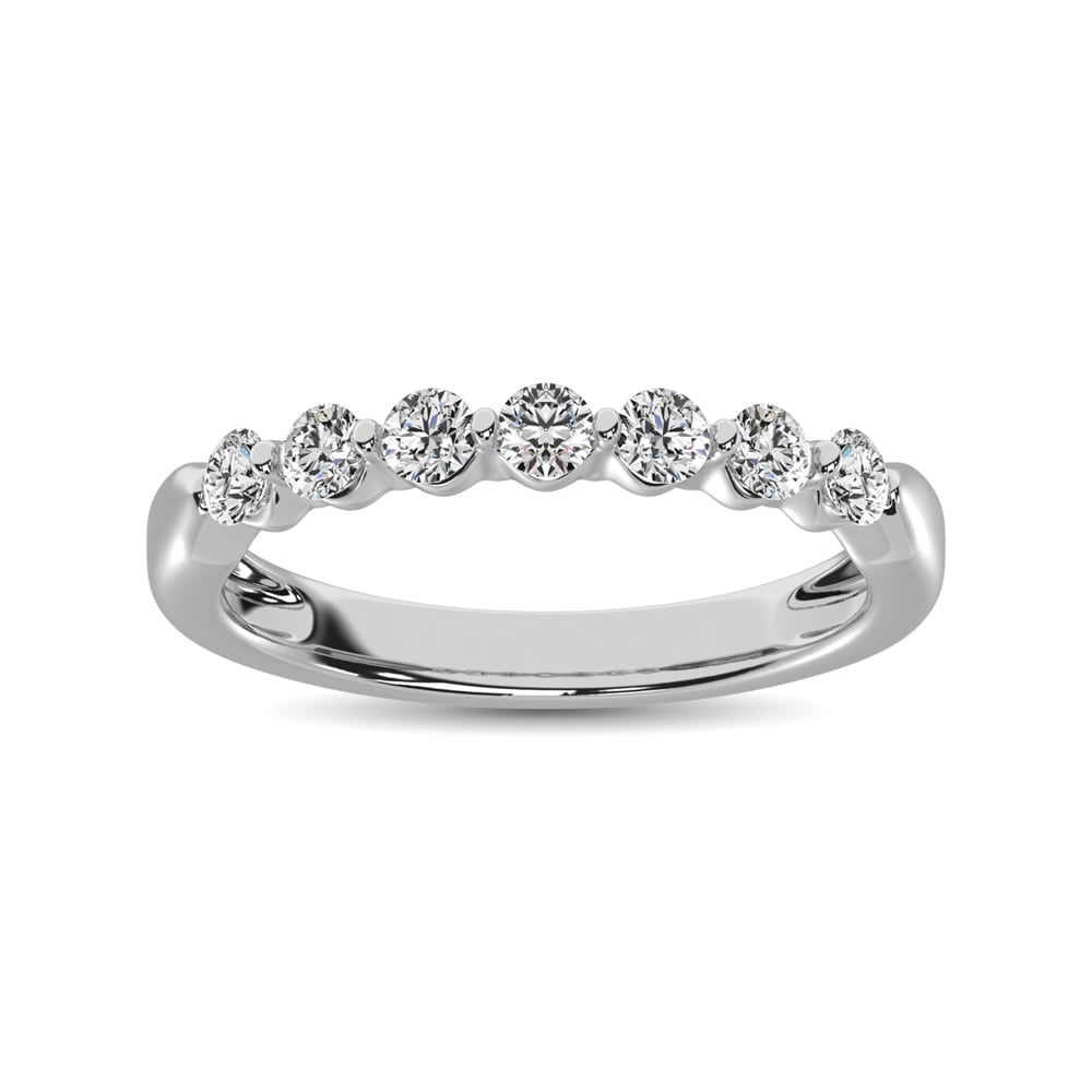 10K White Gold Diamond 1/2 Ct.Tw. Ladies Band: 10K White Gold Diamond 1/2 Ct.Tw. Ladies Band This eye-catching ring is available in 10K White Gold. There are 7 round diamonds with a total carat weight of 1/2 Ct.Tw. set in a Prong setting. 10k Whit