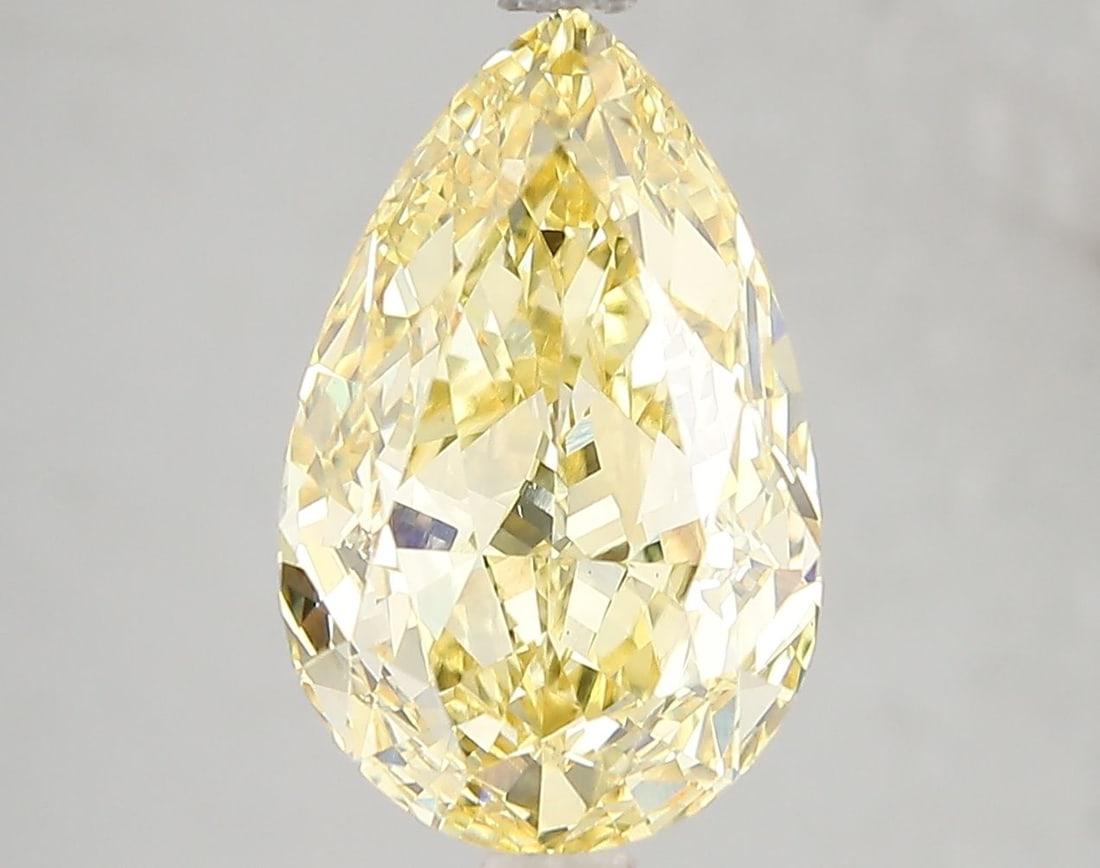 Loose Diamond - PEAR 5.02ct Fancy Vivid Yellow VS1: Loose Diamond - PEAR 5.02ct Fancy Vivid Yellow VS1 Source: This is a real non-mined Diamond that has been grown in a lab Shape: PEAR Carats: 5.02 Color: Fancy Vivid Yellow Certification: IGI Video: