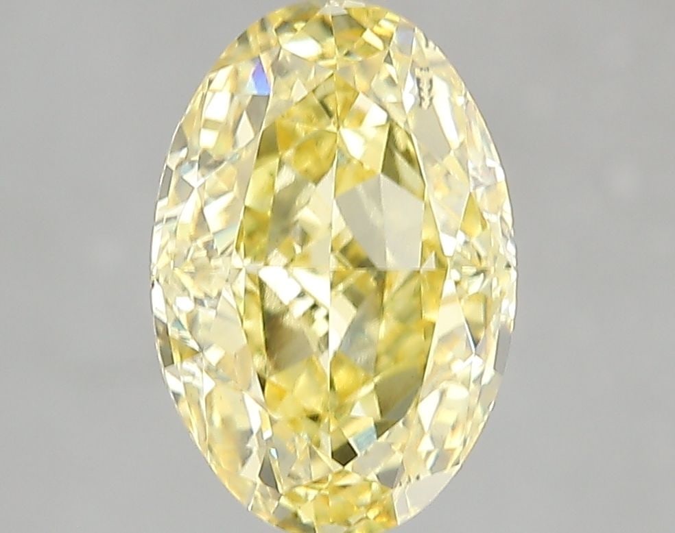 Loose Diamond - OVAL 3.02ct Fancy Vivid Yellow VS2: Loose Diamond - OVAL 3.02ct Fancy Vivid Yellow VS2 Source: This is a real non-mined Diamond that has been grown in a lab Shape: OVAL Carats: 3.02 Color: Fancy Vivid Yellow Certification: IGI Video: