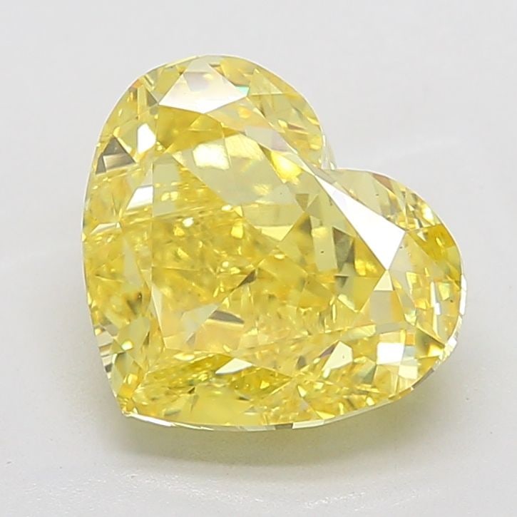 Loose Diamond - HEART 6.23ct Fancy Vivid Yellow VS1: Loose Diamond - HEART 6.23ct Fancy Vivid Yellow VS1 Source: This is a real non-mined Diamond that has been grown in a lab Shape: HEART Carats: 6.23 Color: Fancy Vivid Yellow Certification: IGI Video: