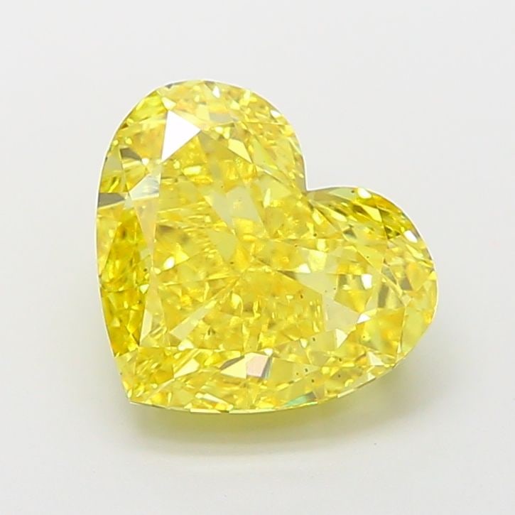 Loose Diamond - HEART 4.75ct Fancy Vivid Yellow VS2: Loose Diamond - HEART 4.75ct Fancy Vivid Yellow VS2 Source: This is a real non-mined Diamond that has been grown in a lab Shape: HEART Carats: 4.75 Color: Fancy Vivid Yellow Certification: IGI Video: