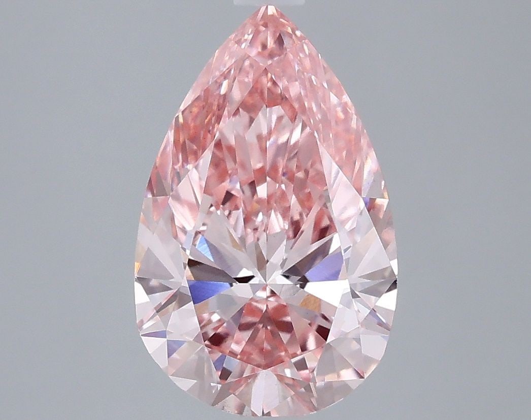 Loose Diamond - PEAR 2.57ct Fancy Vivid Pink VVS2: Loose Diamond - PEAR 2.57ct Fancy Vivid Pink VVS2 Source: This is a real non-mined Diamond that has been grown in a lab Shape: PEAR Carats: 2.57 Color: Fancy Vivid Pink Certification: IGI Video: