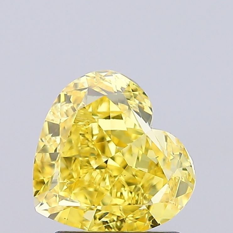 Loose Diamond - HEART 2.02ct Fancy Vivid Yellow VS1: Loose Diamond - HEART 2.02ct Fancy Vivid Yellow VS1 Source: This is a real non-mined Diamond that has been grown in a lab Shape: HEART Carats: 2.02 Color: Fancy Vivid Yellow Certification: IGI Video: