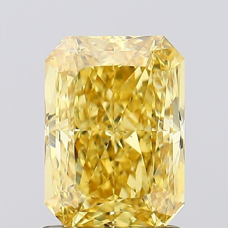 Loose Diamond - RADIANT 1.35ct Fancy Vivid Yellow VS1: Loose Diamond - RADIANT 1.35ct Fancy Vivid Yellow VS1 Source: This is a real non-mined Diamond that has been grown in a lab Shape: RADIANT Carats: 1.35 Color: Fancy Vivid Yellow Certification: IGI Vid