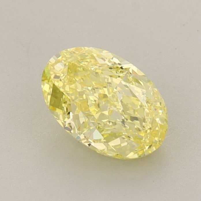 Loose Diamond - OVAL 0.9ct Fancy Vivid Yellow VS1: Loose Diamond - OVAL 0.9ct Fancy Vivid Yellow VS1 Source: This is a real non-mined Diamond that has been grown in a lab Shape: OVAL Carats: 0.9 Color: Fancy Vivid Yellow Certification: IGI Video: