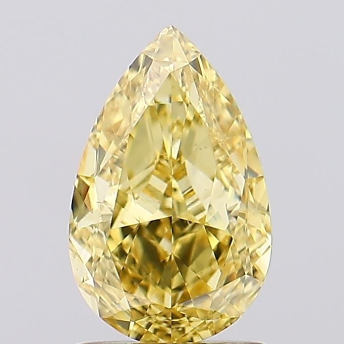 Loose Diamond - PEAR 1.65ct Fancy Vivid Yellow VS1: Loose Diamond - PEAR 1.65ct Fancy Vivid Yellow VS1 Source: This is a real non-mined Diamond that has been grown in a lab Shape: PEAR Carats: 1.65 Color: Fancy Vivid Yellow Certification: IGI Video: