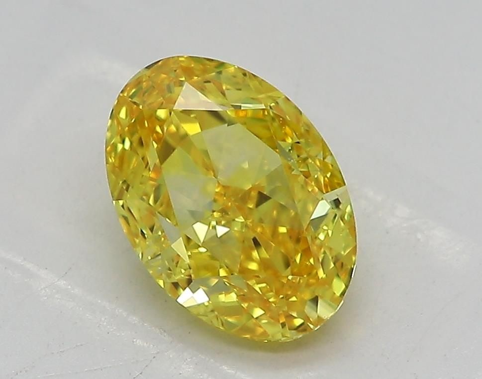 Loose Diamond - OVAL 1.5ct Fancy Vivid Yellow VVS2: Loose Diamond - OVAL 1.5ct Fancy Vivid Yellow VVS2 Source: This is a real non-mined Diamond that has been grown in a lab Shape: OVAL Carats: 1.5 Color: Fancy Vivid Yellow Certification: IGI Video: