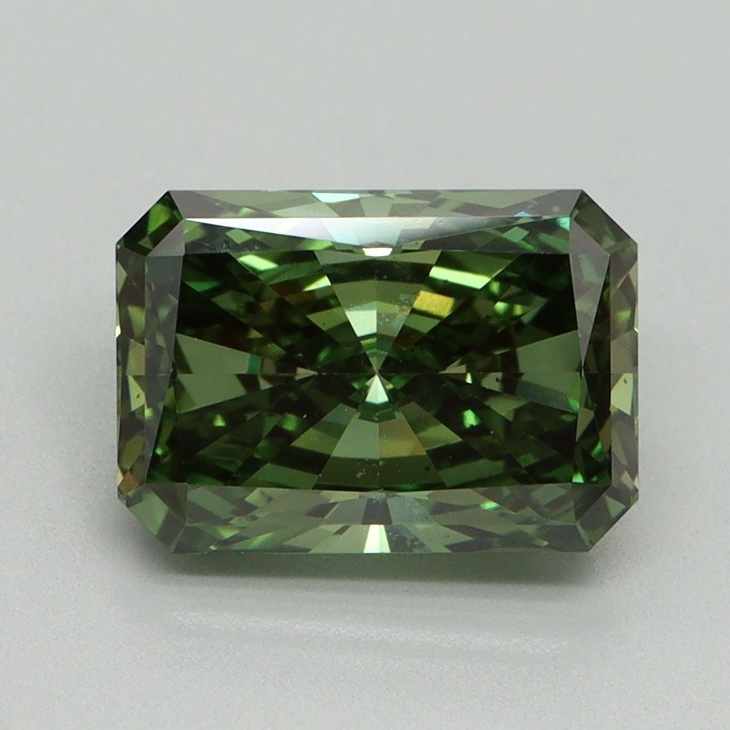 Loose Diamond - RADIANT 3.05ct Fancy Vivid Green VS2: Loose Diamond - RADIANT 3.05ct Fancy Vivid Green VS2 Source: This is a real non-mined Diamond that has been grown in a lab Shape: RADIANT Carats: 3.05 Color: Fancy Vivid Green Certification: IGI Video