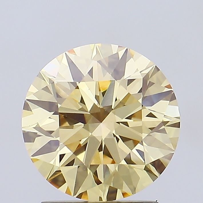Ideal Loose Diamond - ROUND 2.03ct Fancy Yellow VVS2: Ideal Loose Diamond - ROUND 2.03ct Fancy Yellow VVS2 Source: This is a real non-mined Diamond that has been grown in a lab Shape: ROUND Carats: 2.03 Color: Fancy Yellow Certification: IGI Video: