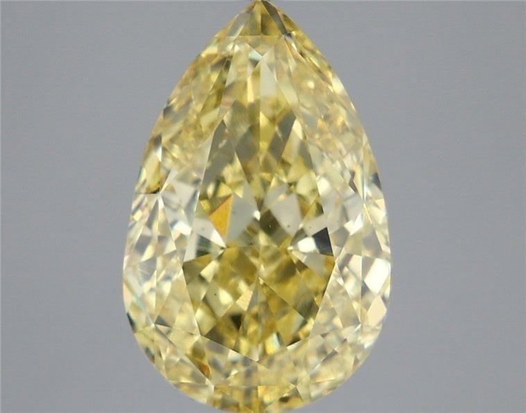 Loose Diamond - PEAR 6.05ct Fancy Vivid Yellow VS2: Loose Diamond - PEAR 6.05ct Fancy Vivid Yellow VS2 Source: This is a real non-mined Diamond that has been grown in a lab Shape: PEAR Carats: 6.05 Color: Fancy Vivid Yellow Certification: IGI Video: