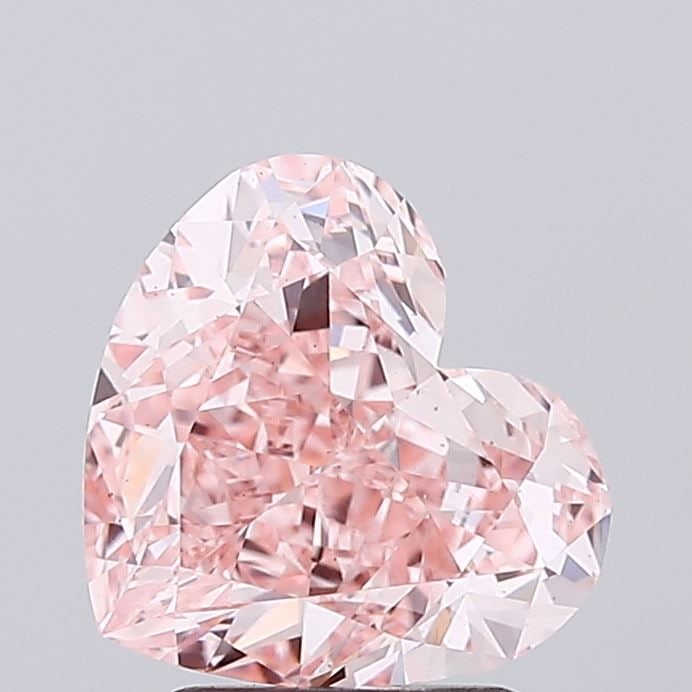 Loose Diamond - HEART 2.84ct Fancy Vivid Pink VS1: Loose Diamond - HEART 2.84ct Fancy Vivid Pink VS1 Source: This is a real non-mined Diamond that has been grown in a lab Shape: HEART Carats: 2.84 Color: Fancy Vivid Pink Certification: IGI Video: