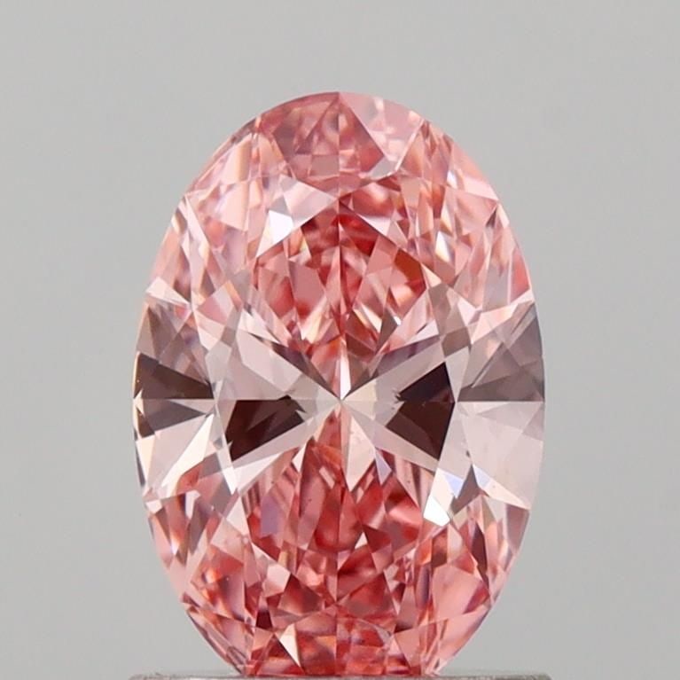 Loose Diamond - OVAL 1.07ct Fancy Vivid Pink VS2: Loose Diamond - OVAL 1.07ct Fancy Vivid Pink VS2 Source: This is a real non-mined Diamond that has been grown in a lab Shape: OVAL Carats: 1.07 Color: Fancy Vivid Pink Certification: IGI Video: