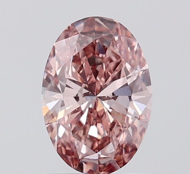 Loose Diamond - OVAL 1.03ct Fancy Pinkish Brown SI1: Loose Diamond - OVAL 1.03ct Fancy Pinkish Brown SI1 Source: This is a real non-mined Diamond that has been grown in a lab Shape: OVAL Carats: 1.03 Color: Fancy Pinkish Brown Certification: IGI Video: