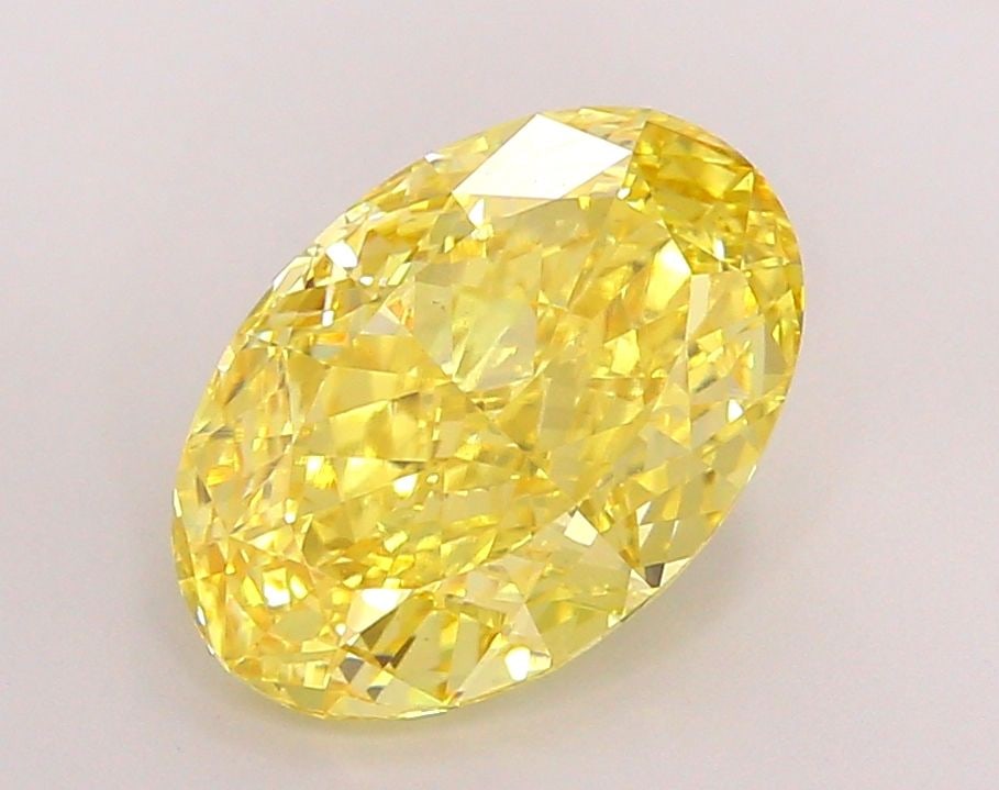 Loose Diamond - OVAL 5.09ct Fancy Vivid Yellow VS1: Loose Diamond - OVAL 5.09ct Fancy Vivid Yellow VS1 Source: This is a real non-mined Diamond that has been grown in a lab Shape: OVAL Carats: 5.09 Color: Fancy Vivid Yellow Certification: IGI Video: