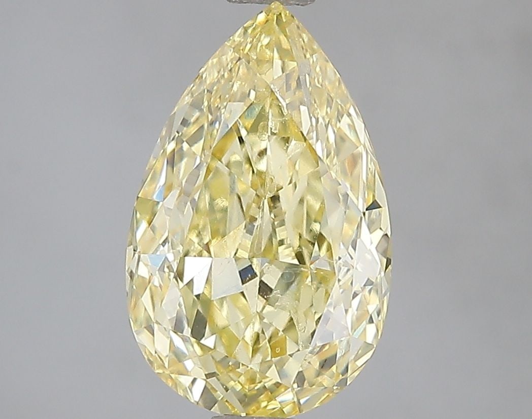 Loose Diamond - PEAR 2.81ct Fancy Intense Yellow VVS2: Loose Diamond - PEAR 2.81ct Fancy Intense Yellow VVS2 Source: This is a real non-mined Diamond that has been grown in a lab Shape: PEAR Carats: 2.81 Color: Fancy Intense Yellow Certification: IGI Vide