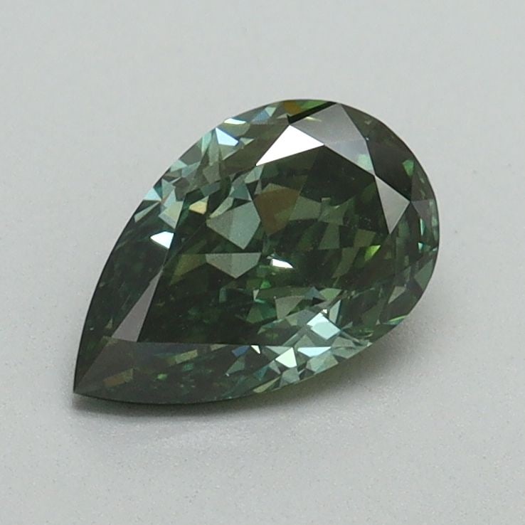 Loose Diamond - PEAR 0.82ct Fancy Vivid Green SI1: Loose Diamond - PEAR 0.82ct Fancy Vivid Green SI1 Source: This is a real non-mined Diamond that has been grown in a lab Shape: PEAR Carats: 0.82 Color: Fancy Vivid Green Certification: IGI Video: