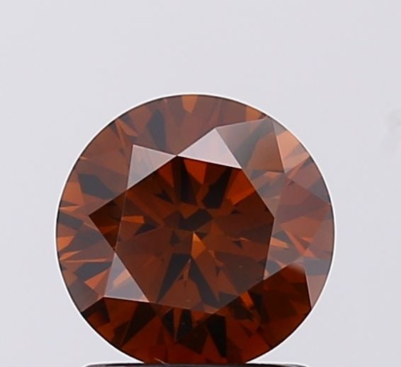 Ideal Loose Diamond - ROUND 1.11ct Fancy Deep Brown VS2: Ideal Loose Diamond - ROUND 1.11ct Fancy Deep Brown VS2 Source: This is a real non-mined Diamond that has been grown in a lab Shape: ROUND Carats: 1.11 Color: Fancy Deep Brown Certification: IGI Video