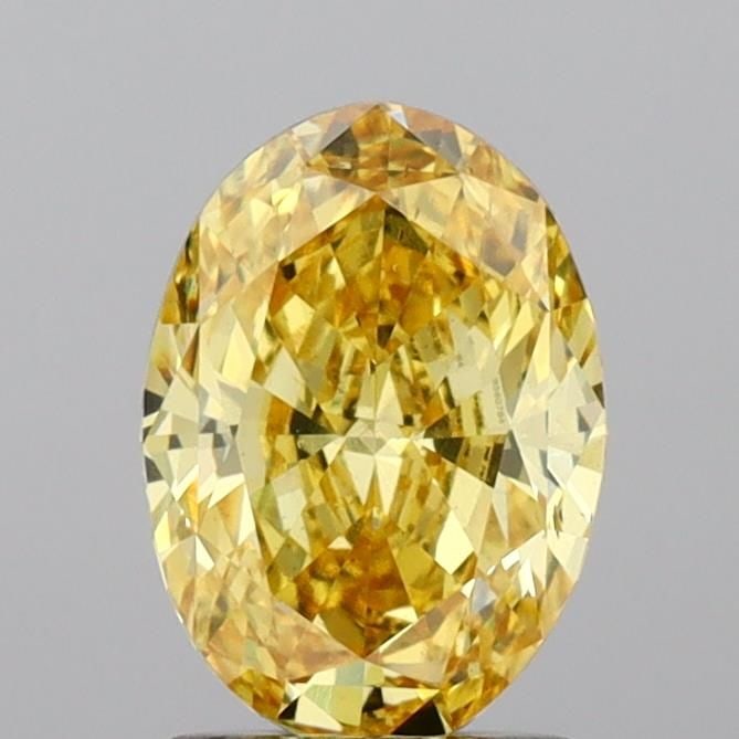 Loose Diamond - OVAL 1.61ct Fancy Vivid Yellow VS2: Loose Diamond - OVAL 1.61ct Fancy Vivid Yellow VS2 Source: This is a real non-mined Diamond that has been grown in a lab Shape: OVAL Carats: 1.61 Color: Fancy Vivid Yellow Certification: IGI Video: