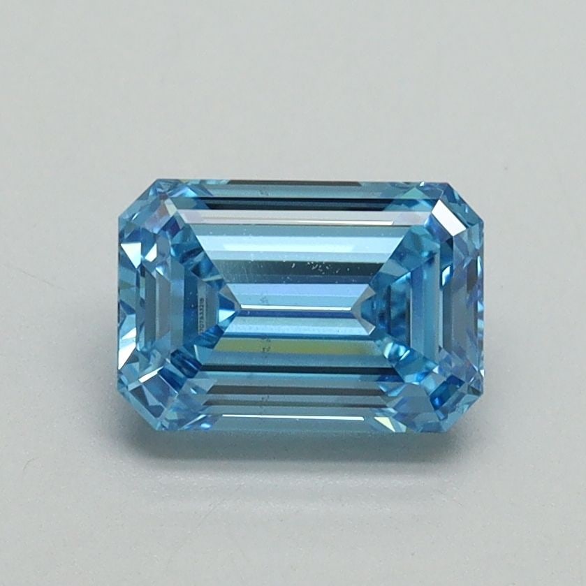 Loose Diamond - EMERALD 1.08ct Fancy Vivid Blue VS2: Loose Diamond - EMERALD 1.08ct Fancy Vivid Blue VS2 Source: This is a real non-mined Diamond that has been grown in a lab Shape: EMERALD Carats: 1.08 Color: Fancy Vivid Blue Certification: IGI Video:
