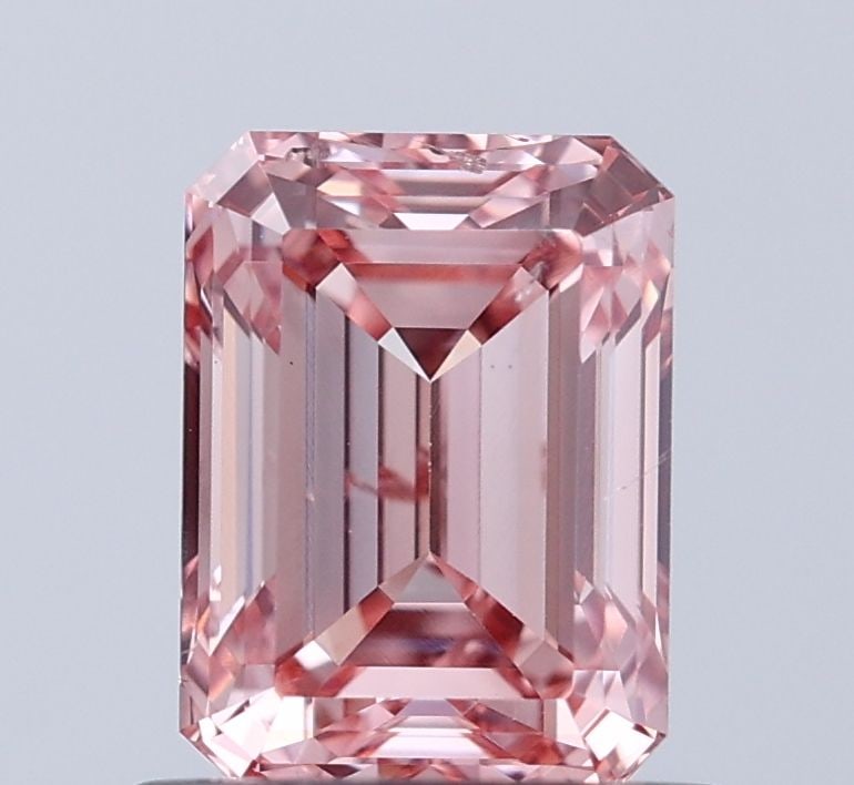 Loose Diamond - EMERALD 1.0ct Fancy Vivid Pink SI1: Loose Diamond - EMERALD 1.0ct Fancy Vivid Pink SI1 Source: This is a real non-mined Diamond that has been grown in a lab Shape: EMERALD Carats: 1.0 Color: Fancy Vivid Pink Certification: IGI Video: