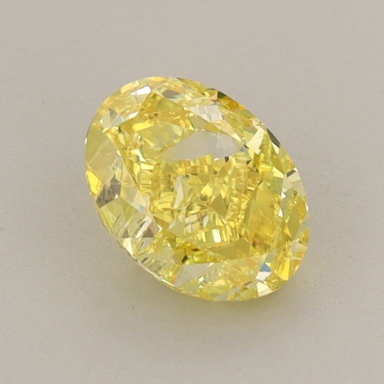 Loose Diamond - OVAL 1.01ct Fancy Vivid Yellow VVS2: Loose Diamond - OVAL 1.01ct Fancy Vivid Yellow VVS2 Source: This is a real non-mined Diamond that has been grown in a lab Shape: OVAL Carats: 1.01 Color: Fancy Vivid Yellow Certification: IGI Video: