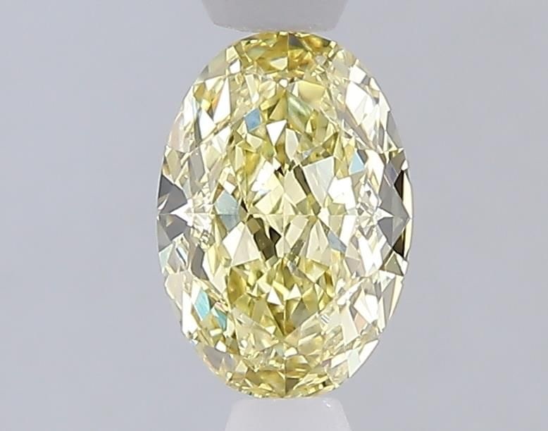 Loose Diamond - OVAL 1.06ct Fancy Intense Yellow VVS1: Loose Diamond - OVAL 1.06ct Fancy Intense Yellow VVS1 Source: This is a real non-mined Diamond that has been grown in a lab Shape: OVAL Carats: 1.06 Color: Fancy Intense Yellow Certification: IGI Vide
