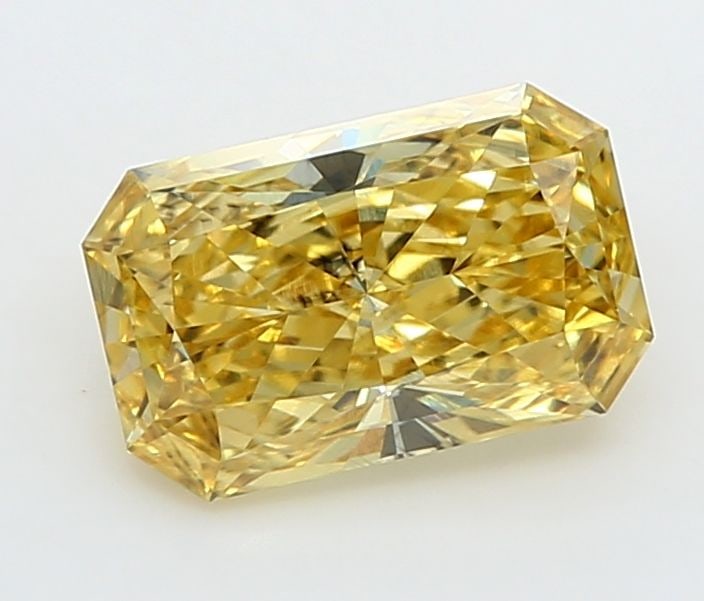 Loose Diamond - RADIANT 1.27ct Fancy Vivid Yellow VS2: Loose Diamond - RADIANT 1.27ct Fancy Vivid Yellow VS2 Source: This is a real non-mined Diamond that has been grown in a lab Shape: RADIANT Carats: 1.27 Color: Fancy Vivid Yellow Certification: IGI Vid