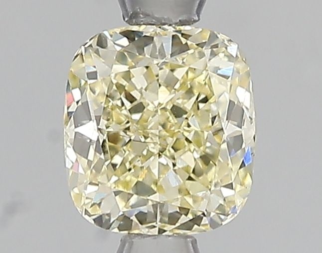 Loose Diamond - CUSHION MODIFIED 1.04ct Fancy Light Yellow VS2: Loose Diamond - CUSHION MODIFIED 1.04ct Fancy Light Yellow VS2 Source: This is a real non-mined Diamond that has been grown in a lab Shape: CUSHION MODIFIED Carats: 1.04 Color: Fancy Light Yellow Cert