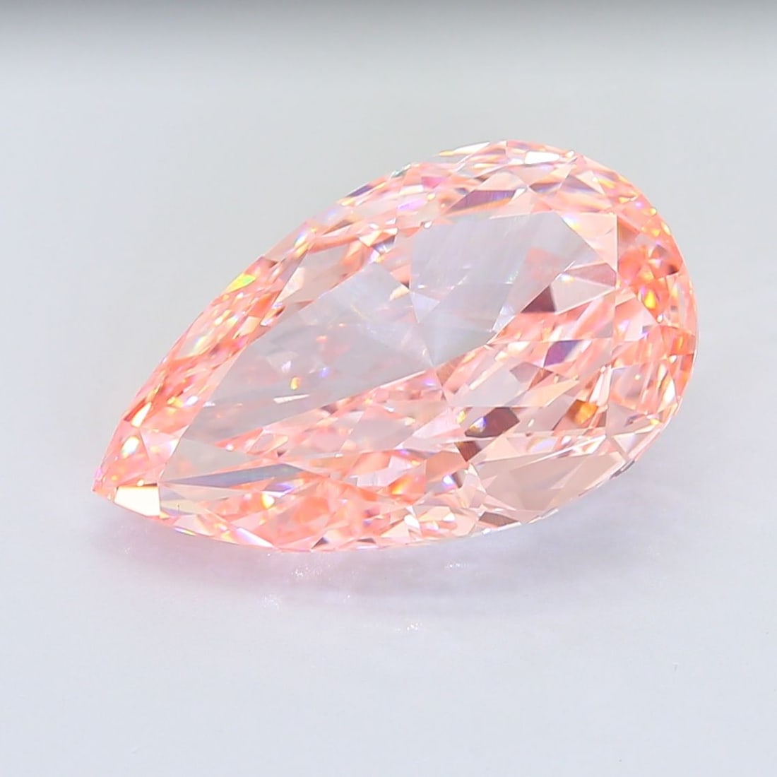 Loose Diamond - PEAR 14.07ct Fancy Intense Pink VVS2: Loose Diamond - PEAR 14.07ct Fancy Intense Pink VVS2 Source: This is a real non-mined Diamond that has been grown in a lab Shape: PEAR Carats: 14.07 Color: Fancy Intense Pink Certification: IGI Video: