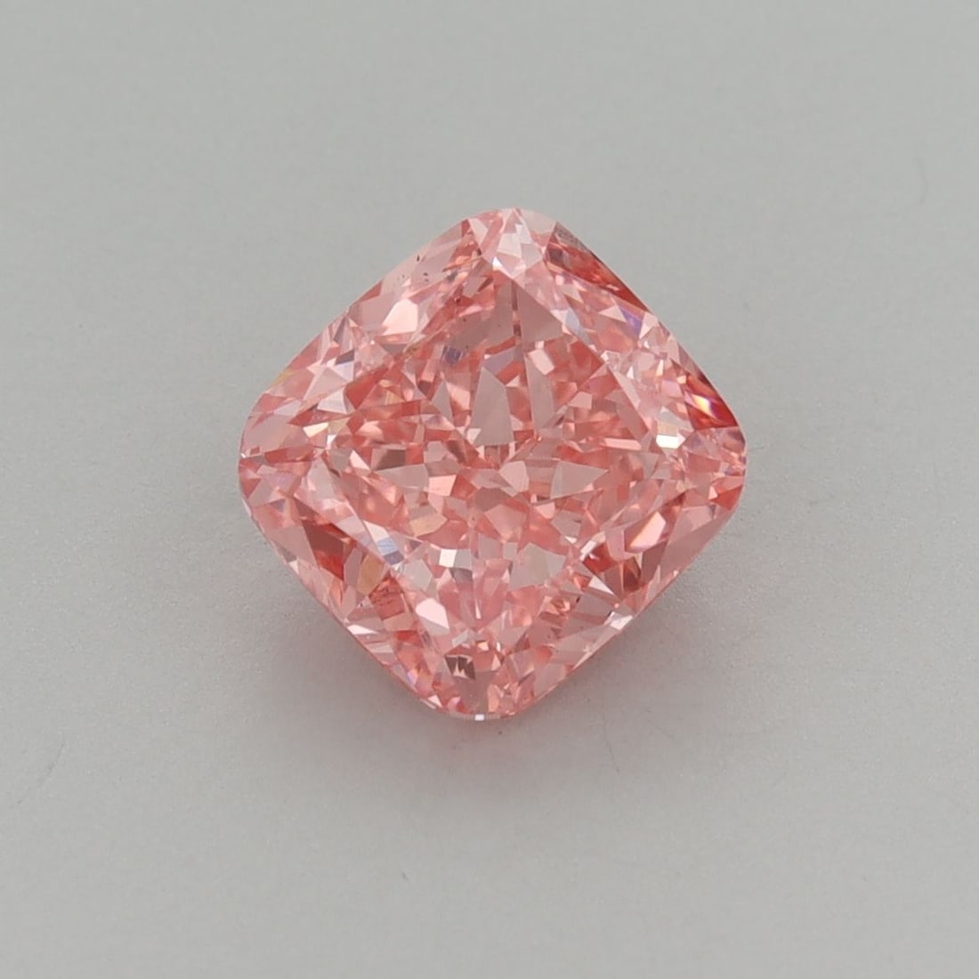 Loose Diamond - CUSHION BRILLIANT 2.13ct Fancy Vivid Pink VS1: Loose Diamond - CUSHION BRILLIANT 2.13ct Fancy Vivid Pink VS1 Source: This is a real non-mined Diamond that has been grown in a lab Shape: CUSHION BRILLIANT Carats: 2.13 Color: Fancy Vivid Pink Certif