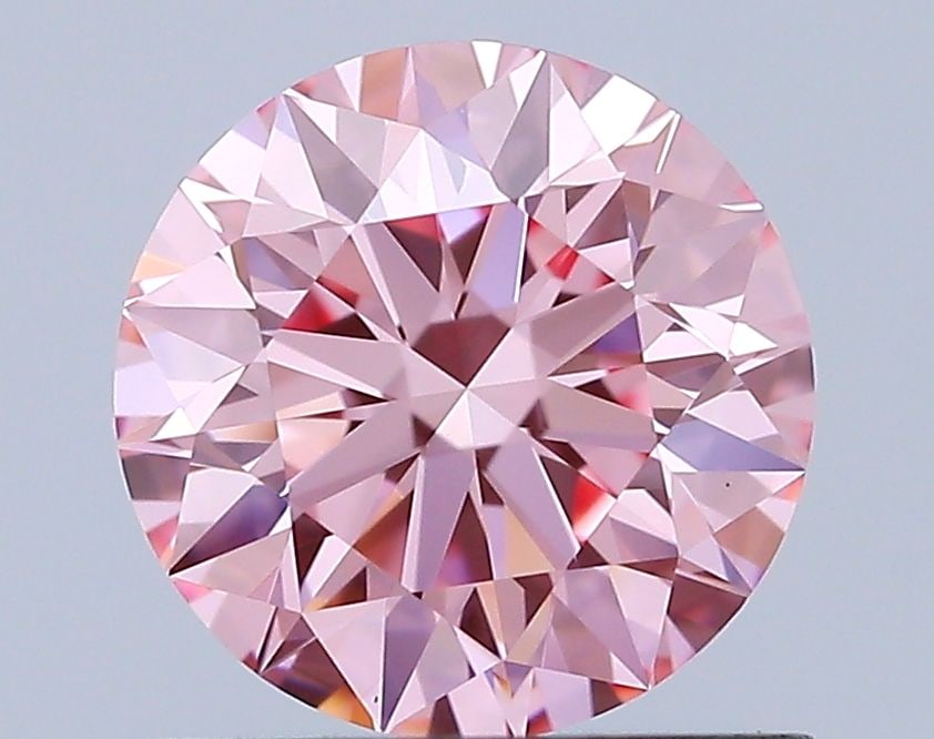 Ideal Loose Diamond - ROUND 0.91ct Fancy Vivid Pink VS1: Ideal Loose Diamond - ROUND 0.91ct Fancy Vivid Pink VS1 Source: This is a real non-mined Diamond that has been grown in a lab Shape: ROUND Carats: 0.91 Color: Fancy Vivid Pink Certification: IGI The D