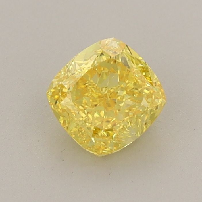 Loose Diamond - CUSHION MODIFIED 0.7ct Fancy Vivid Yellow VVS2: Loose Diamond - CUSHION MODIFIED 0.7ct Fancy Vivid Yellow VVS2 Source: This is a real non-mined Diamond that has been grown in a lab Shape: CUSHION MODIFIED Carats: 0.7 Color: Fancy Vivid Yellow Certi